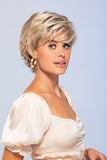 Woman with hair loss showing her short style Jazz wig 