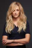 Female with hair loss wearing a golden blonde Remy human hair Blake wig 