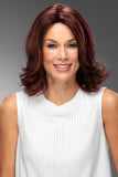 Smiling woman with balding wearing her Shoulder length Carrie wig 