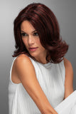 Woman with hair loss wearing the Remy Human hair wig in the style Carrie from Fascinations 
