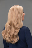 Woman with balding showing the back of her long Chantal Remy human hair wig from Fascinations