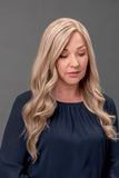 Model with Alopecia wearing the long blonde Chantal wig from the European human hair collection