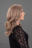 Woman with progressive hair loss showing the 15 inch long bob style human hair Dominique wig 