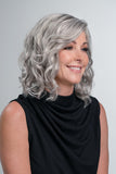 Lady wearing her shoulder length synthetic Julianne Grey Wig by Jon Renau South Africa