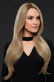 Female with progressive hair loss showing the long blonde Kim human hair wig 