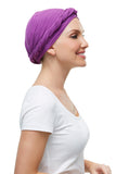 Smiling woman with Alopecia showing the Softie Wrap in purple 
