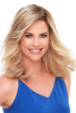 Happy woman with thinning hair wearing the Top Smart Wavy 12 Inch Hair Topper