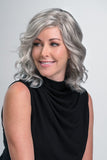 Front view of the new Julianne Grey Wig worn by a lady with alopecia
