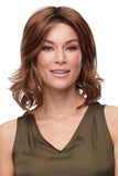Happy woman with thinning hair wearing the Kendall wig with Smartlace technology 