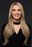 Woman with advanced hair loss wearing the Kim long length Remy human hair wig 