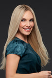 Happy woman with hair fall showing her light blonde human hair Blake wig 