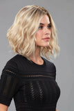 Model with advanced hair loss wearing the Lucy short wavy style wig with a lace front 