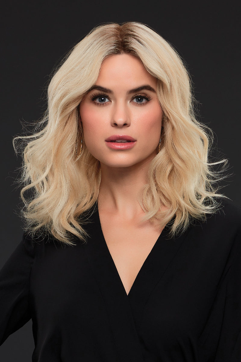 Female with Cicatricial Alopecia wearing a Blonde wavy human hair Margot wig 