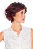 Woman with Alopecia Areata showing the short layered synthetic Mariska wig in the shade FS2V/31V