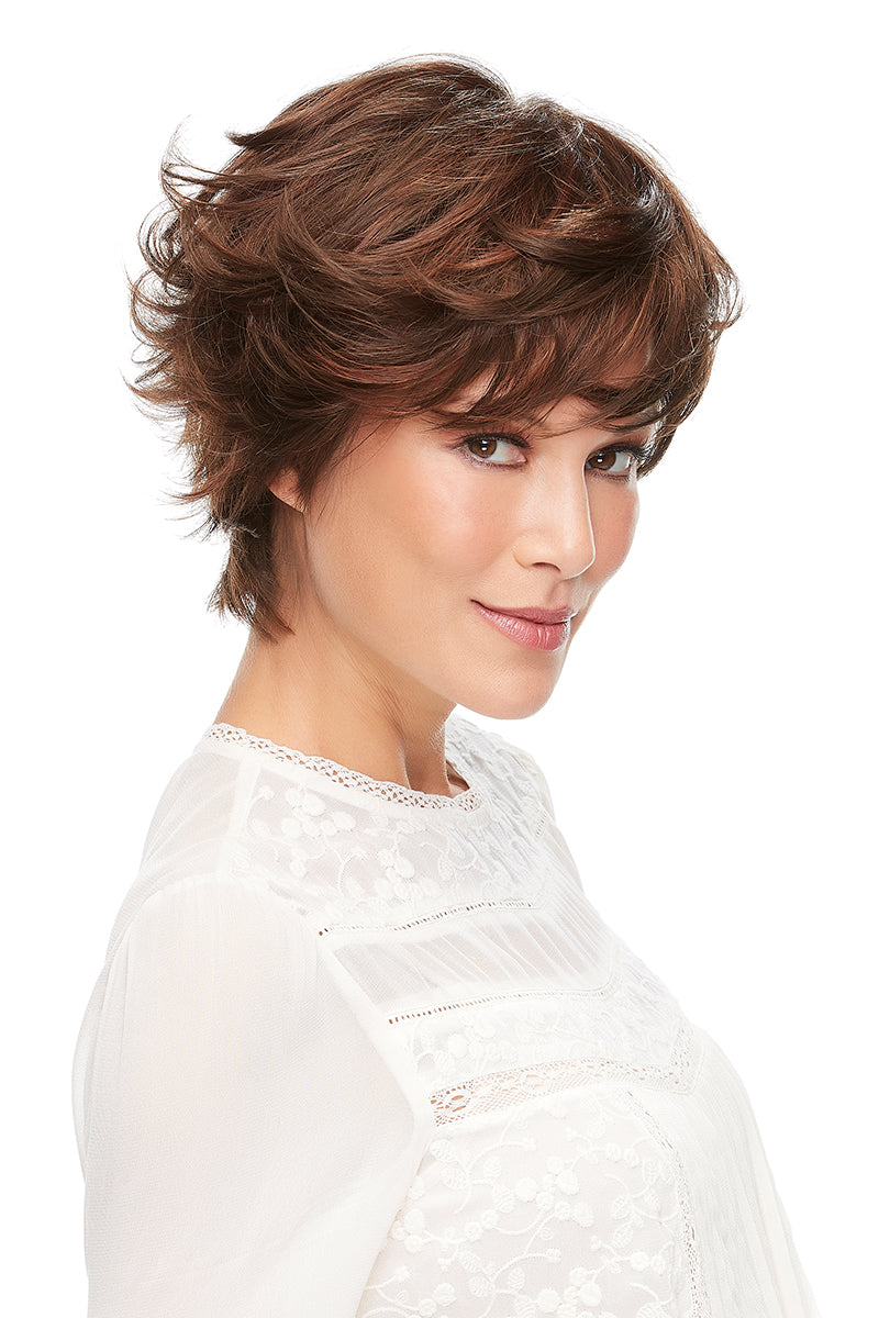 Woman with hair loss wearing the Meg Short Mono Top Synthetic Wig