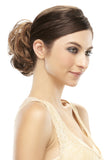 Woman wearing the Mimic hair bun for a quick and easy up do 