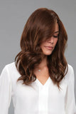Female with progressive hair loss wearing her long Penelope wig with Smartlace technology 