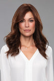 Lady with advanced stage hair loss wearing a long hand tied Penelope Remy human hair wig 