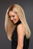 Laughing woman with hair fall showing her hand tied Remy human hair Blake Petite wig 