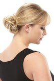 Lady wearing the synthetic Playful Hair Scrunchie in a blonde shade by Jon Renau South Africa 