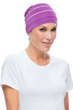 Woman wearing a purple Playful Softie Headwear for Women With Hair Loss 