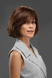 Lady with complete hair loss wearing a Positano wig in the colour 4RN by Jon Renau 