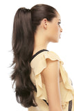 Woman wearing a long brunette synthetic ponytail in the style called Provocative hair piece 