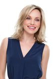 Happy woman with advanced hair loss showing her blonde smartlace Rosie wig from Fascinations 