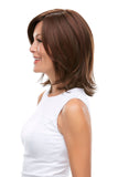 Lady with thinning hair wearing a synthetic Rosie wig with a realistic looking hairline 