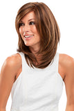 Lady with advanced hair loss covering her head with her Sandra wig from Fascinations 