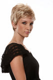 Female with progressive hair loss wearing a short pixie wig in the style Mono Simplicity 