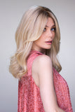 Woman with alopecia wearing a blonde remy human hair sienna wig by Jon Renau