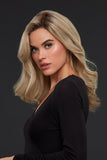 Model with hair loss wearing her long blonde Sienna human hair wig by Jon Renau 