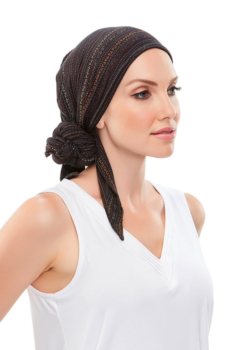 Lady with advanced hair loss wearing a black Softie Wrap 