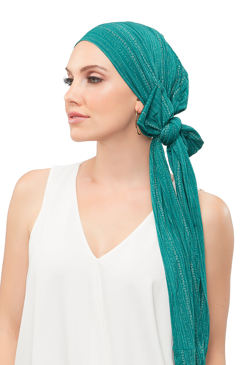 Female with complete hair loss wearing her comfortable Softie Wrap from Fascinations 