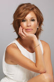 Woman with Alopecia showing her short length human hair wig in the style called Sophia 