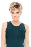Allure Petite wig in a blonde shade is being worn by a female with hair loss