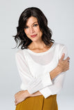 Woman with hair loss covering her head in a way synthetic Top Coverage 12 inch topper in brunette 