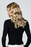 Female with Alopecia showing the back of her wavy 18 inch blonde synthetic Top coverage 18" topper