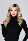 Model with thinning hair covering her head with a long wavy blonde Top Coverage 18 inch topper 