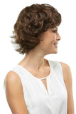 Smiling woman with thinning hair is adding volume by wearing a Top Crown Hair Topper in brunette 