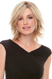 Smiling woman with hair fall covering her hair with a blonde op Form 6 - 8Inch Hair Topper
