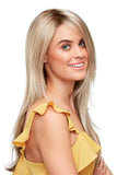 Smiling woman with fine hair wearing a long blonde Zara wig with shaded roots 