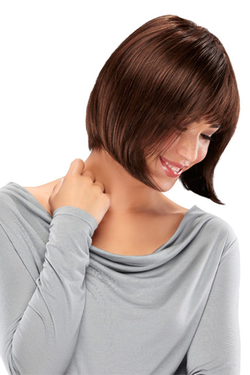 Laughing woman with balding covering her head in a bob style Blair wig 