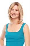 Smiling woman with hair loss wearing her shoulder-length blonde Remy Human hair Courage wig