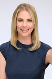 Smiling woman wearing her long blonde Remy human hair 16 inch Easipieces clip in extensions 