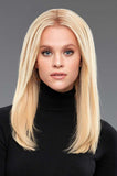 Lady wearing long clip in hair extensions that measure 16 inches long by 9 inches wide