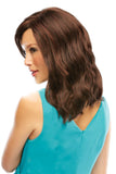 Lady with thinning hair showing her natural looking Heidi synthetic wig 