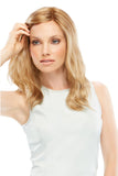 Woman with advanced hair loss wearing the long layered wavy Heidi wig 